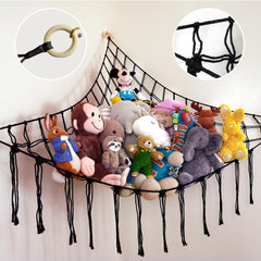 ABBY BABY large stuffed animal hammock corner showing ample toy storage in a cozy playroom.