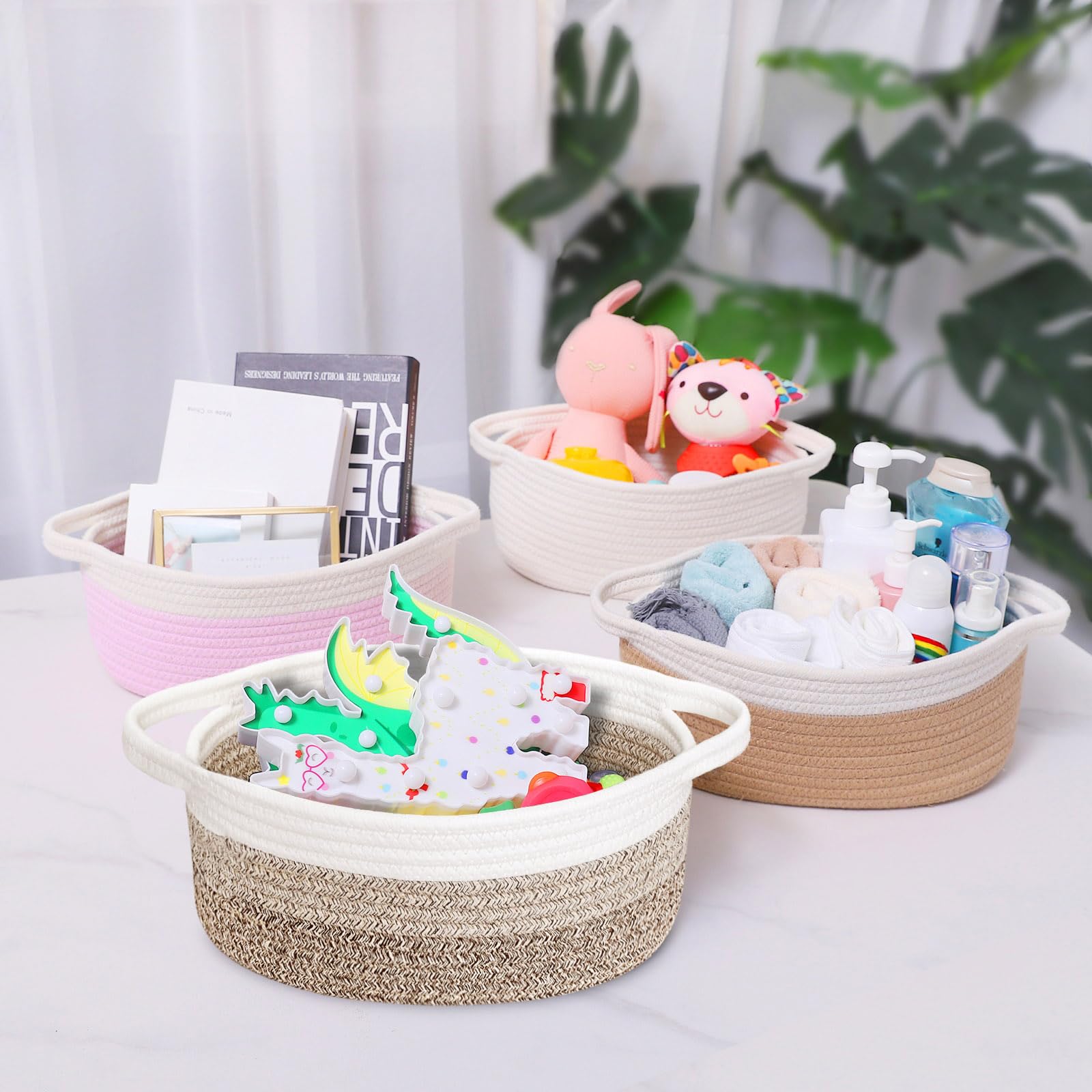 ABenkle baby room organizer basket keeps blankets and toys neatly within reach.