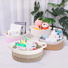 ABenkle baby room organizer basket keeps blankets and toys neatly within reach.