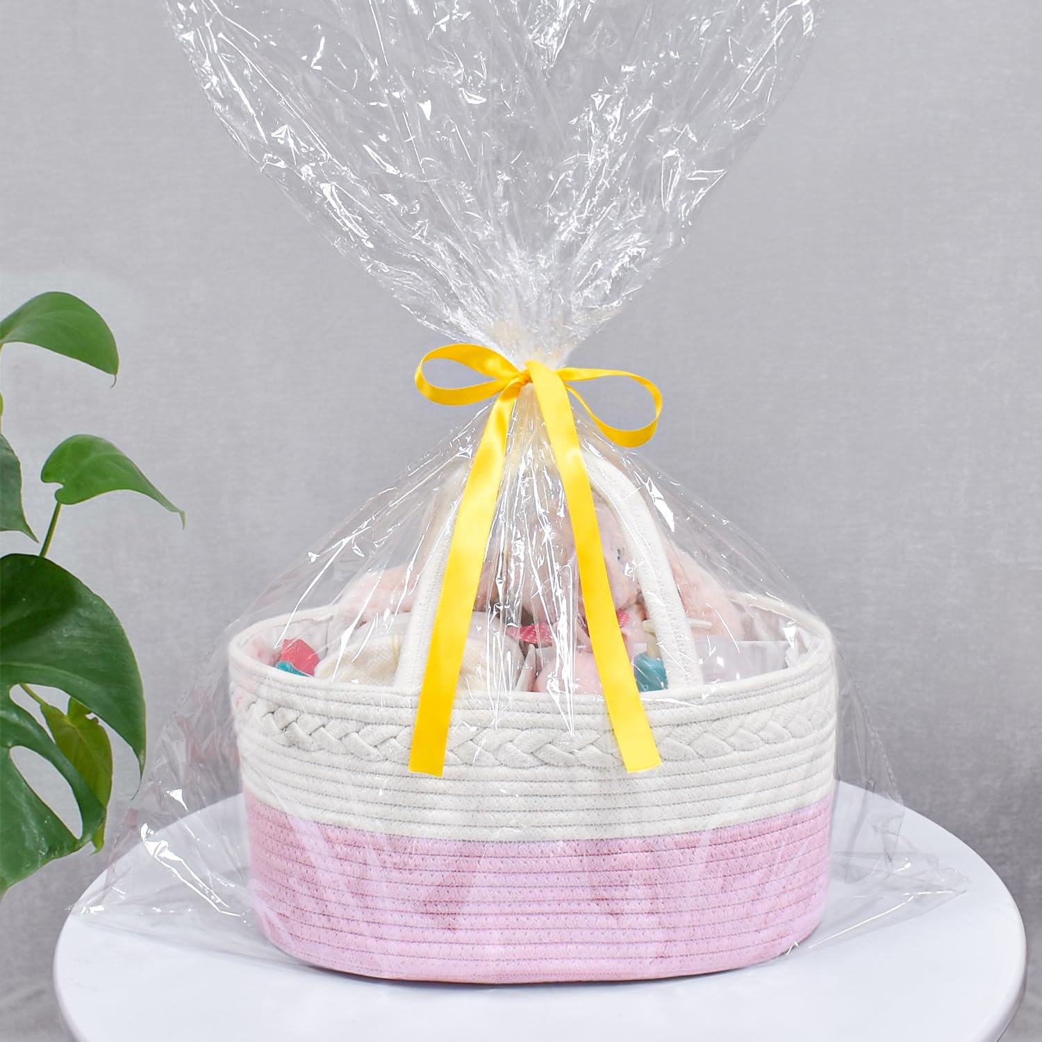 ABenkle portable diaper caddy with sturdy handles for moves around the home.