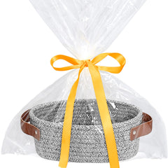 ABenkle small oval basket in natural cotton rope for compact storage.