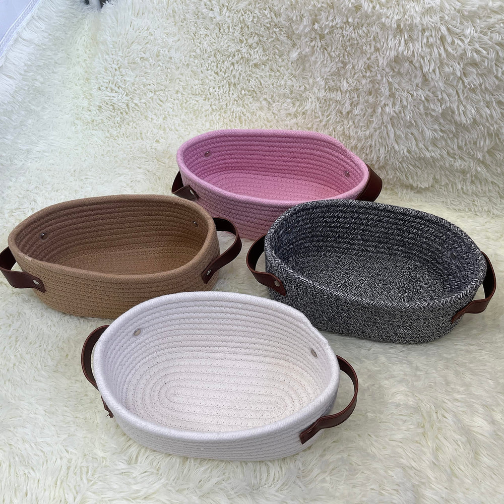 ABenkle small woven basket compact size fits desks and shelves.