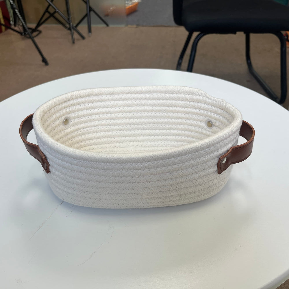 ABenkle small woven basket kid-friendly material safe for toys and snacks.