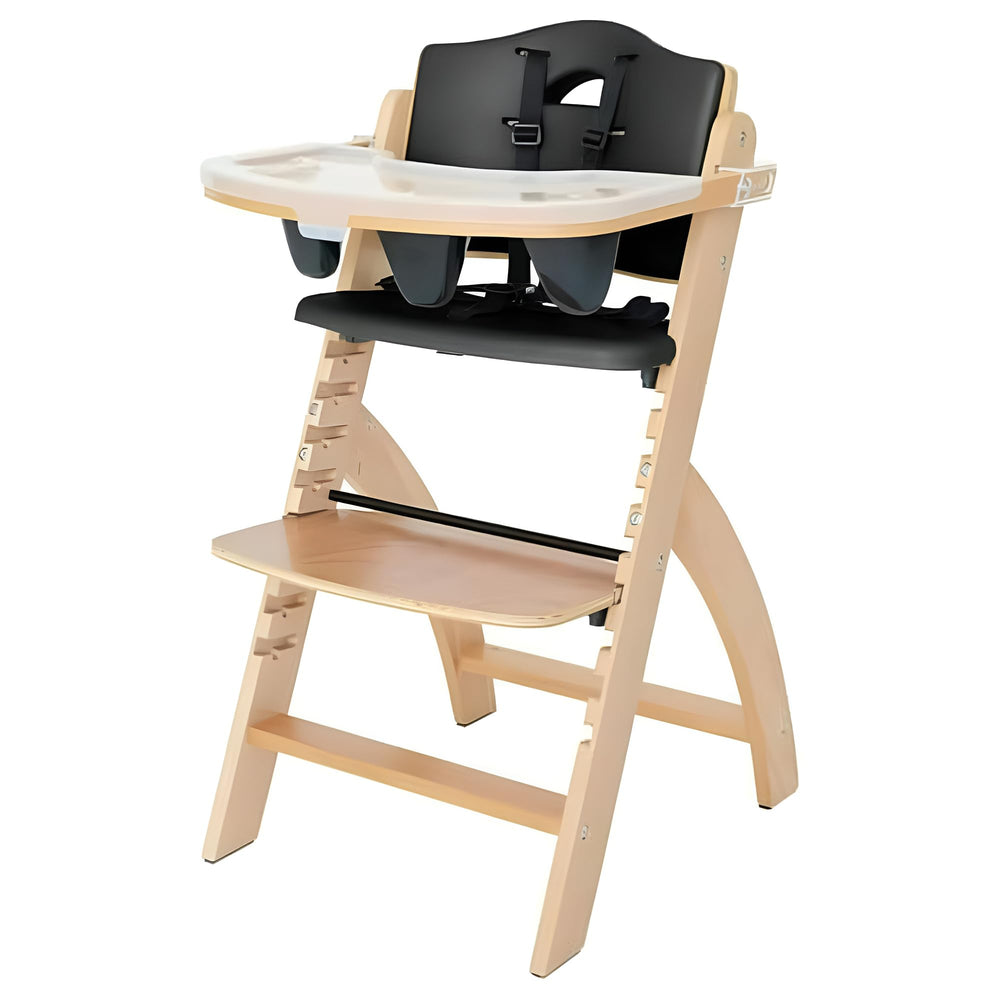 Abiie Beyond Junior high chair with tray and adjustable height for growing kids.