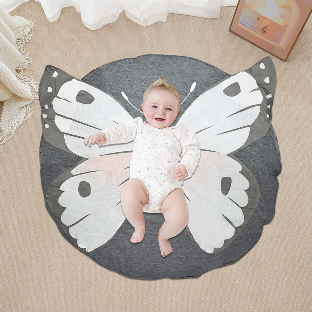 ABREEZE baby crawling on play pad on the floor for tummy time practice.