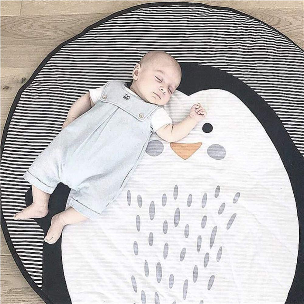 ABREEZE tummy time mat with penguin graphic invites exploration.