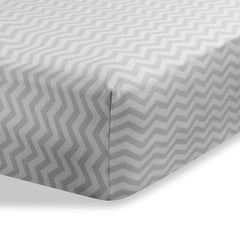 Abstract bassinet sheet in zigzag grey with deep fit for baby comfort.