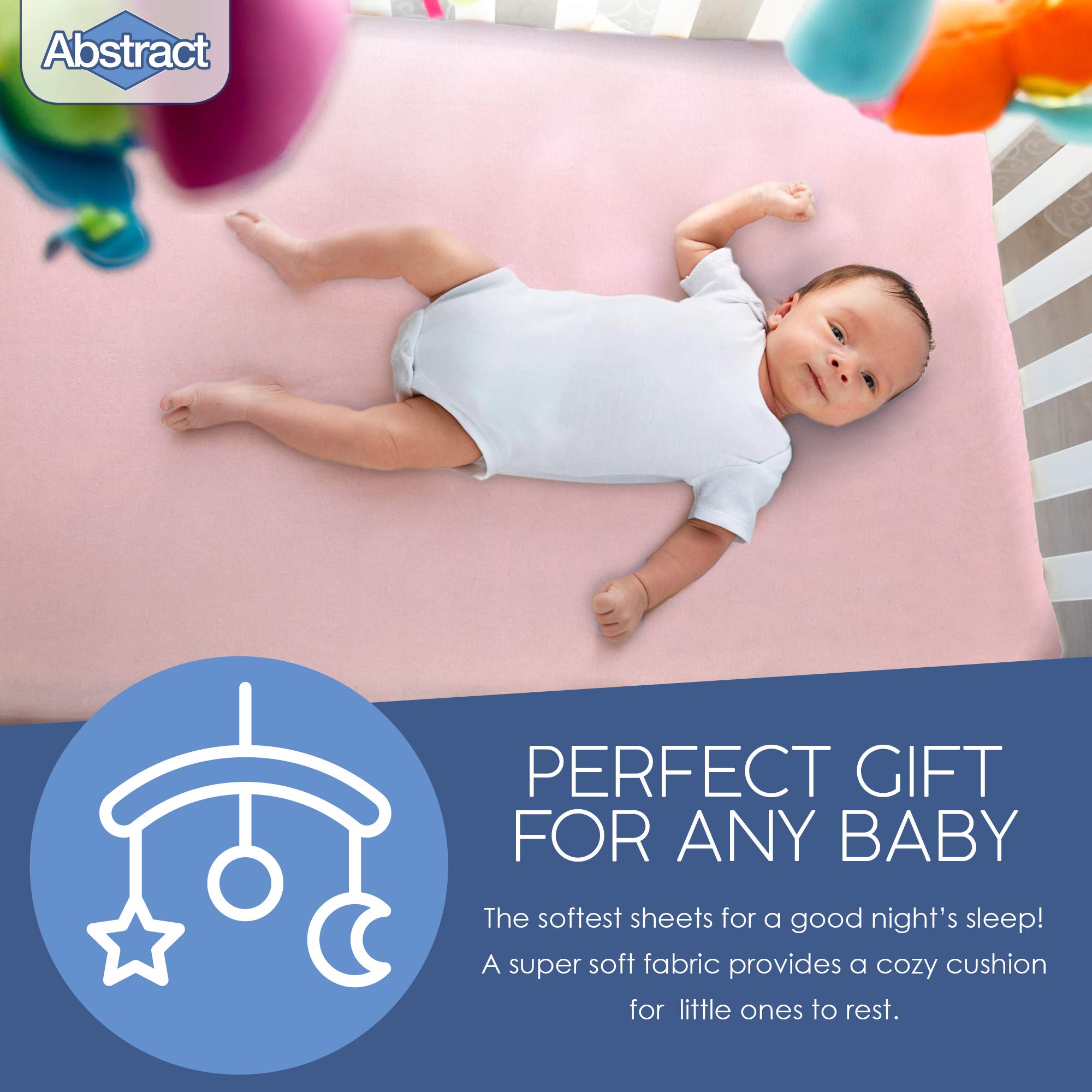 Abstract pink crib sheet in a nursery setup demonstrates versatility.