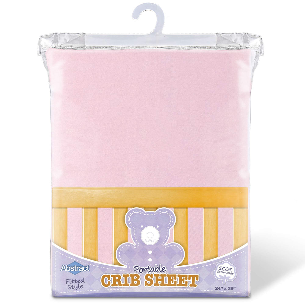 Solid pink Abstract crib sheet complements nursery decor with calm color.