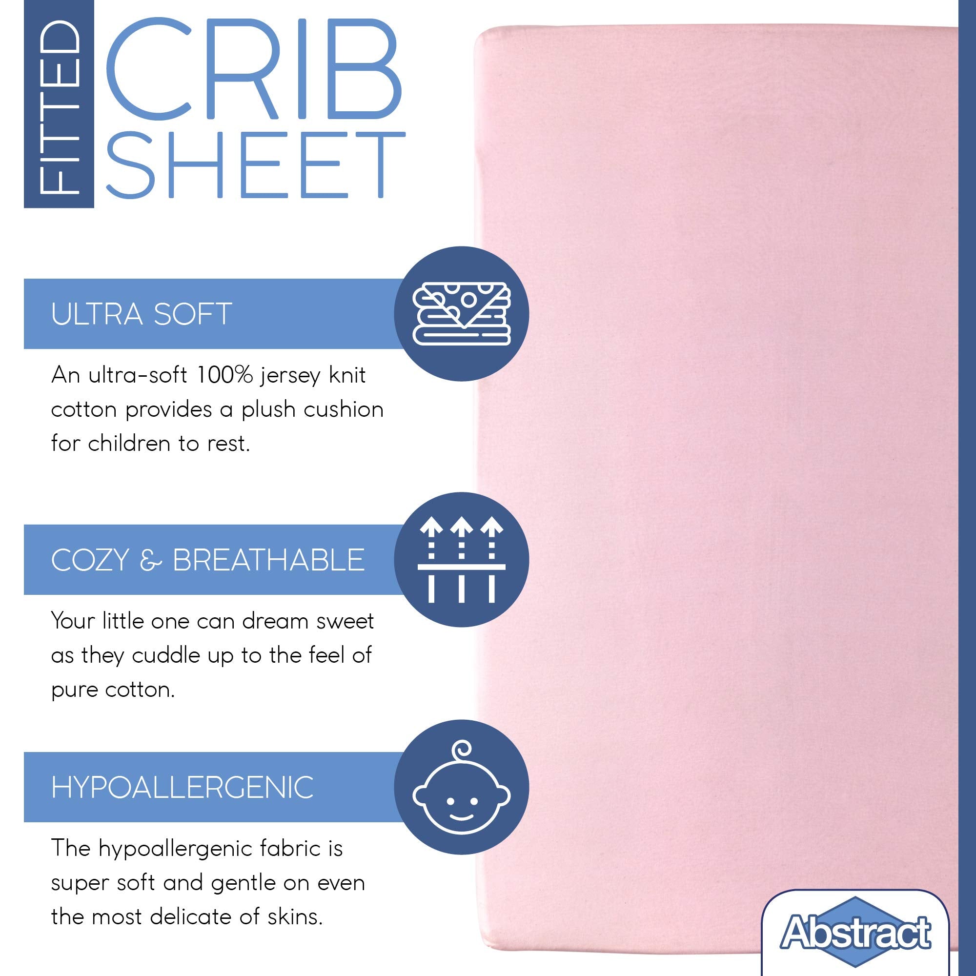 Abstract pink crib sheet on a mattress shows snug, secure fit.
