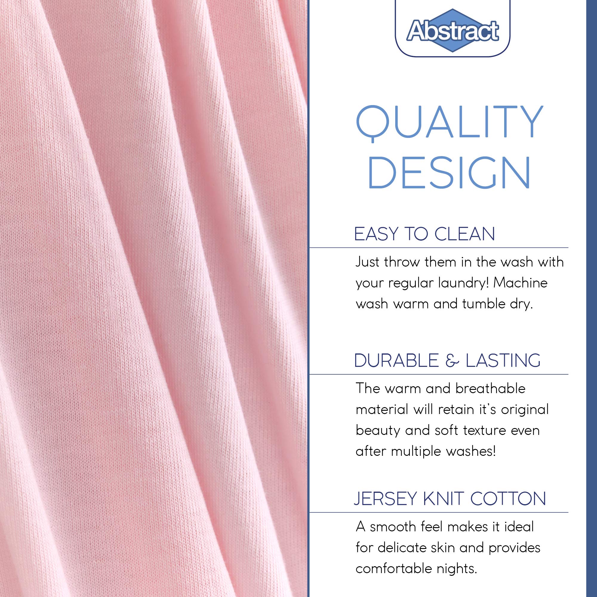 Stacked pink Abstract crib sheets illustrate color and fabric quality.