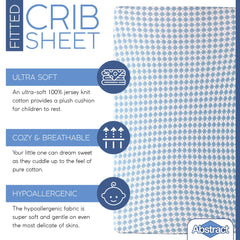 Abstract crib sheets with snug elastic band for a secure fit.