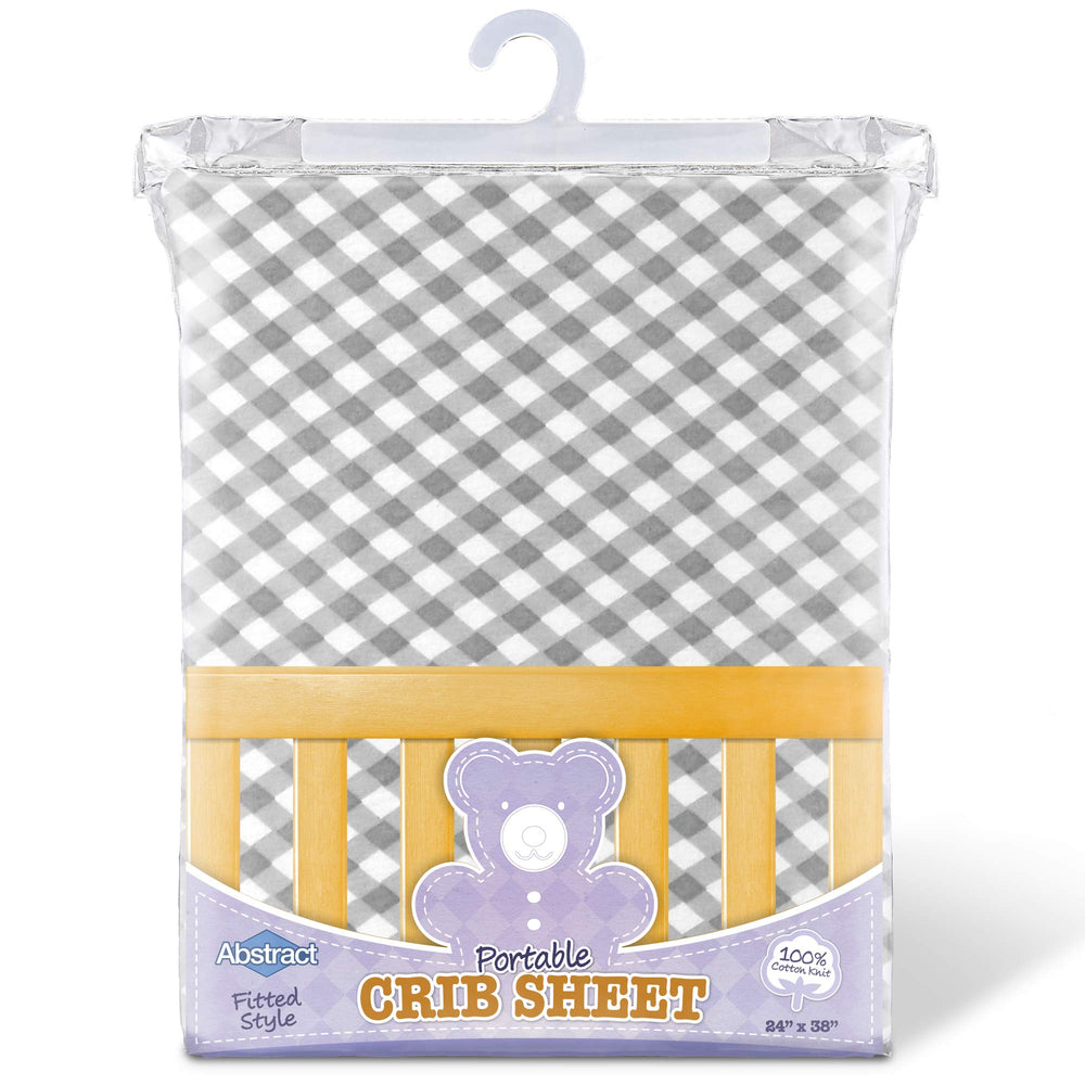 Abstract Solid White Mini Crib Sheets provide clean, breathable cotton comfort and a secure fitted design.