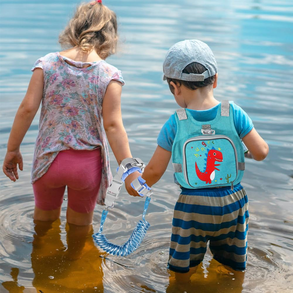 Accmor kid walking in park wearing harness for close supervision