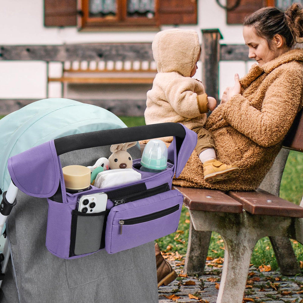 Accmor middle-storage-compartment holds diapers, wipes, and essentials for quick access