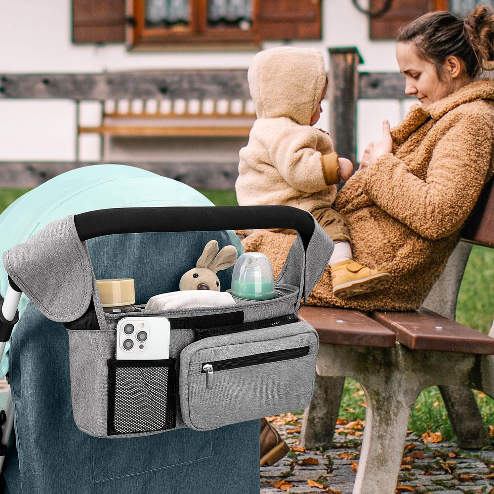 Middle storage compartment holds diapers, wipes and small toys