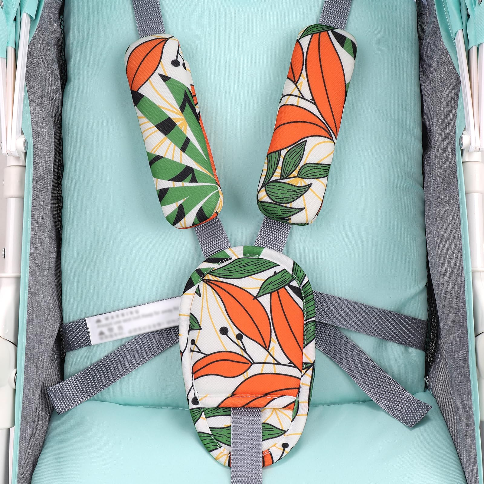 Accmor universal-fit strap pad installed on a car seat belt.