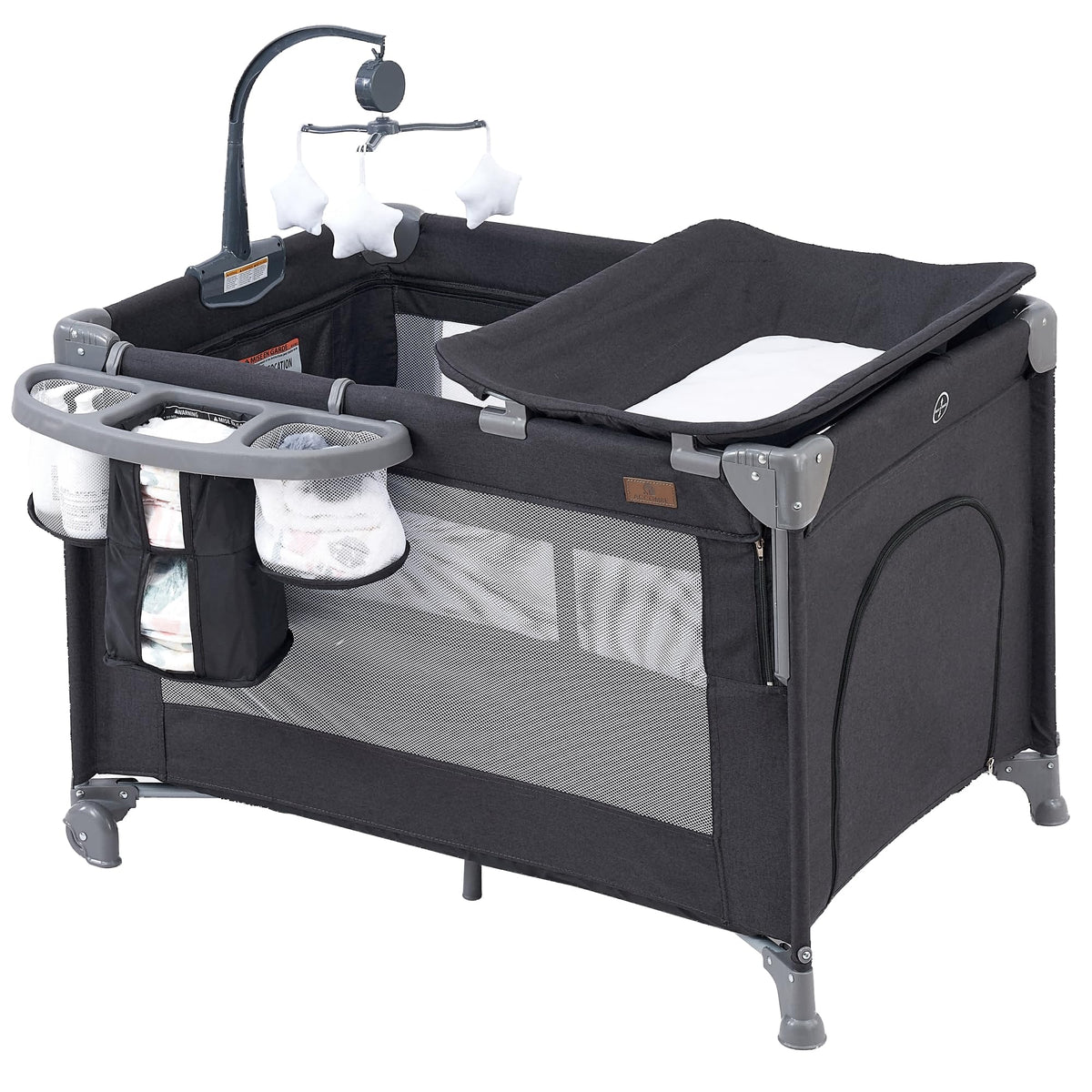 ACCOMBE 5-in-1 bedside sleeper shown close to bed for easy night checks