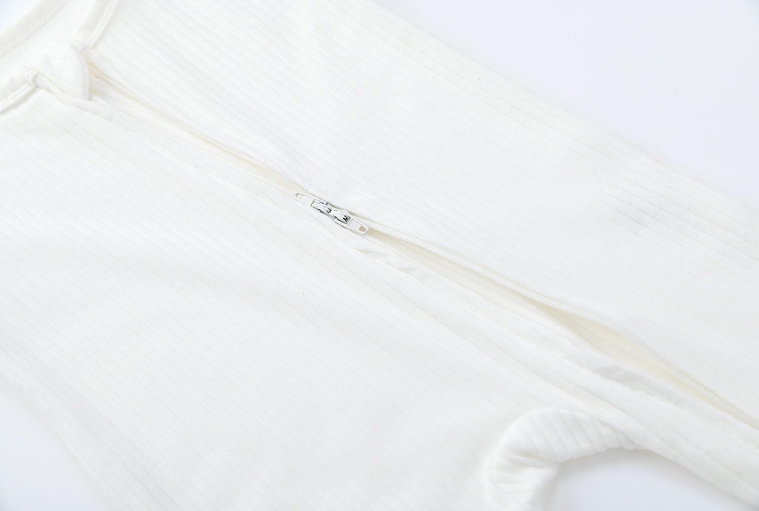 ACESTAR neck-tab protects delicate skin during dressing and undressing.