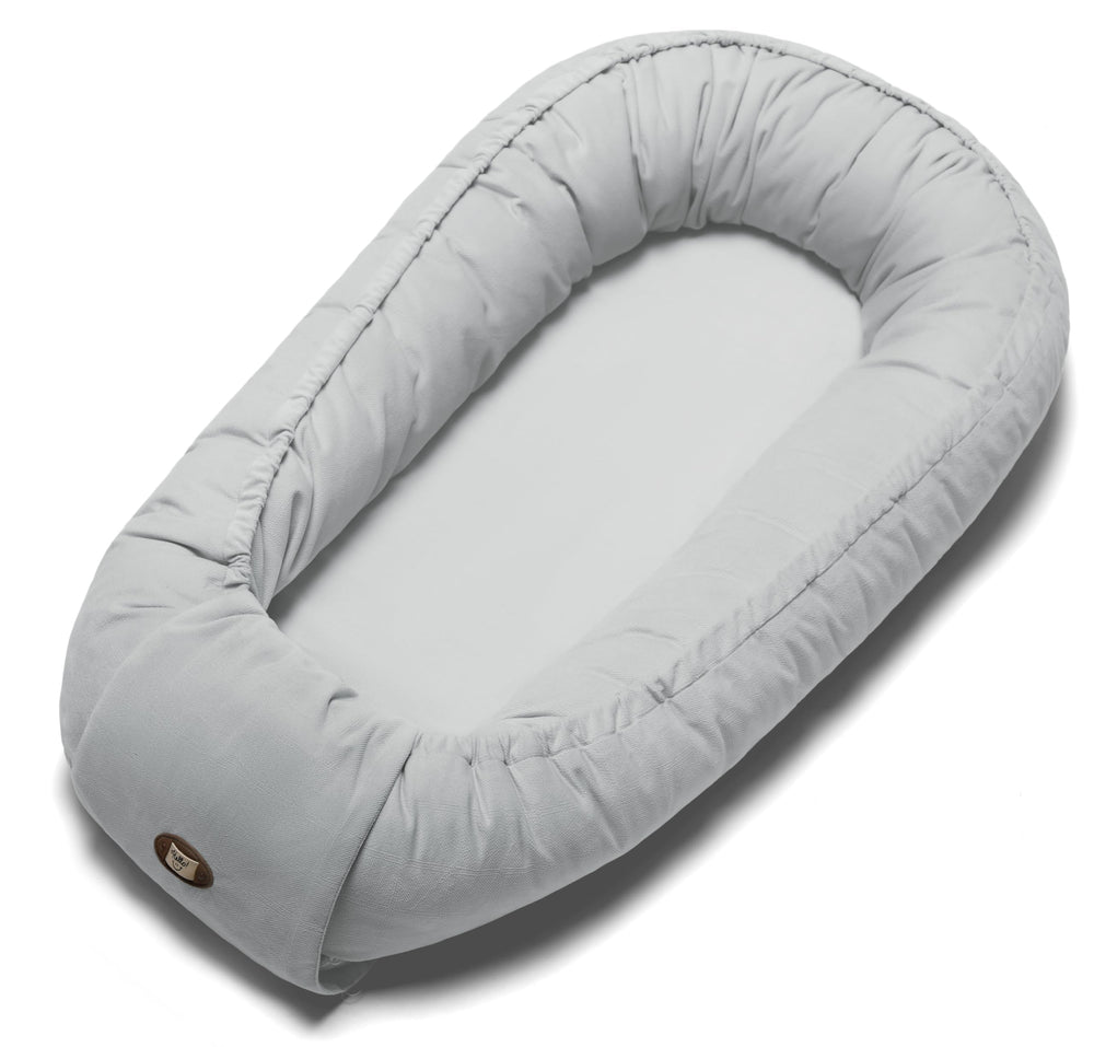 ACIROC baby lounger pillow close-up with soft cotton filling for cozy newborn comfort.