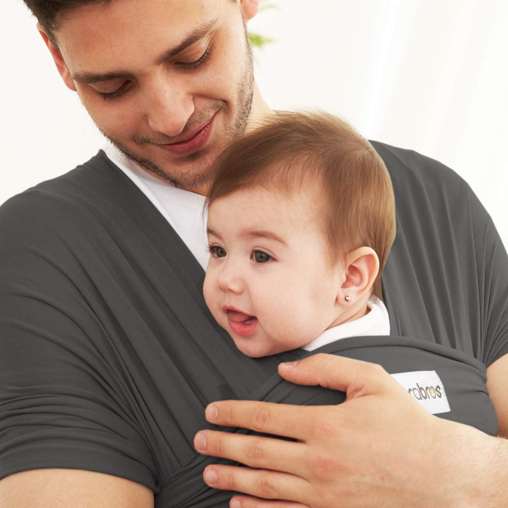 Acrabros charcoal grey wrap keeps baby secure during travel.