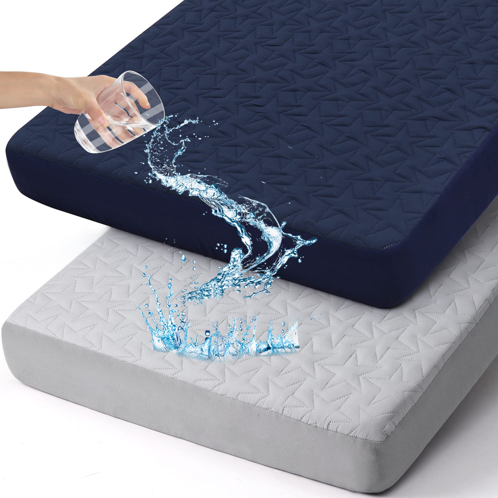 ACRABROS waterproof crib mattress protector folded for easy storage.
