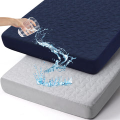 ACRABROS waterproof crib mattress protector folded for easy storage.