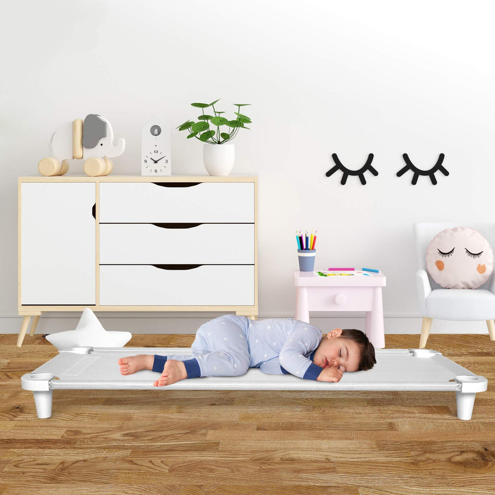 Acrimet Nap Cot with white feet complements classroom decor while elevating the fabric.