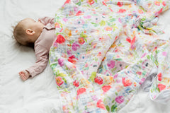 Addison Belle muslin cotton swaddle blanket shows soft texture and airflow for comfy naps.