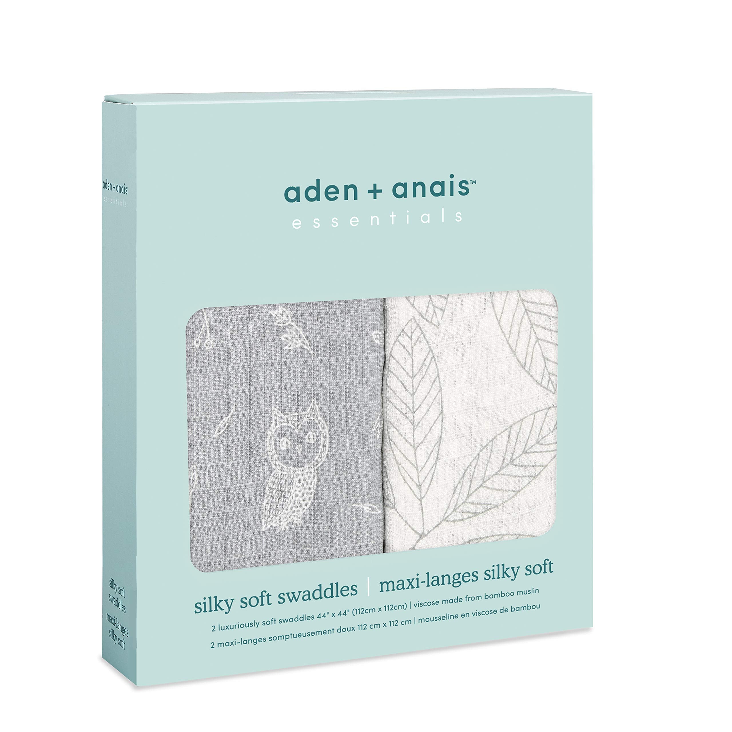 aden + anais silky soft swaddle wrapped around baby for secure, gentle swaddling