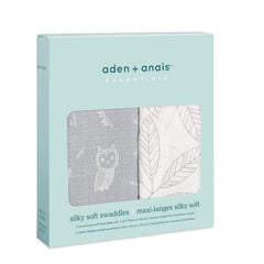 aden + anais silky soft swaddle wrapped around baby for secure, gentle swaddling