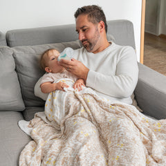 Aden + Anais Dream Blanket laid flat to highlight oversized 60x70 dimensions