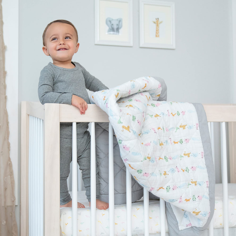 aden + anais essentials alphabet animals print demonstrates modern nursery charm