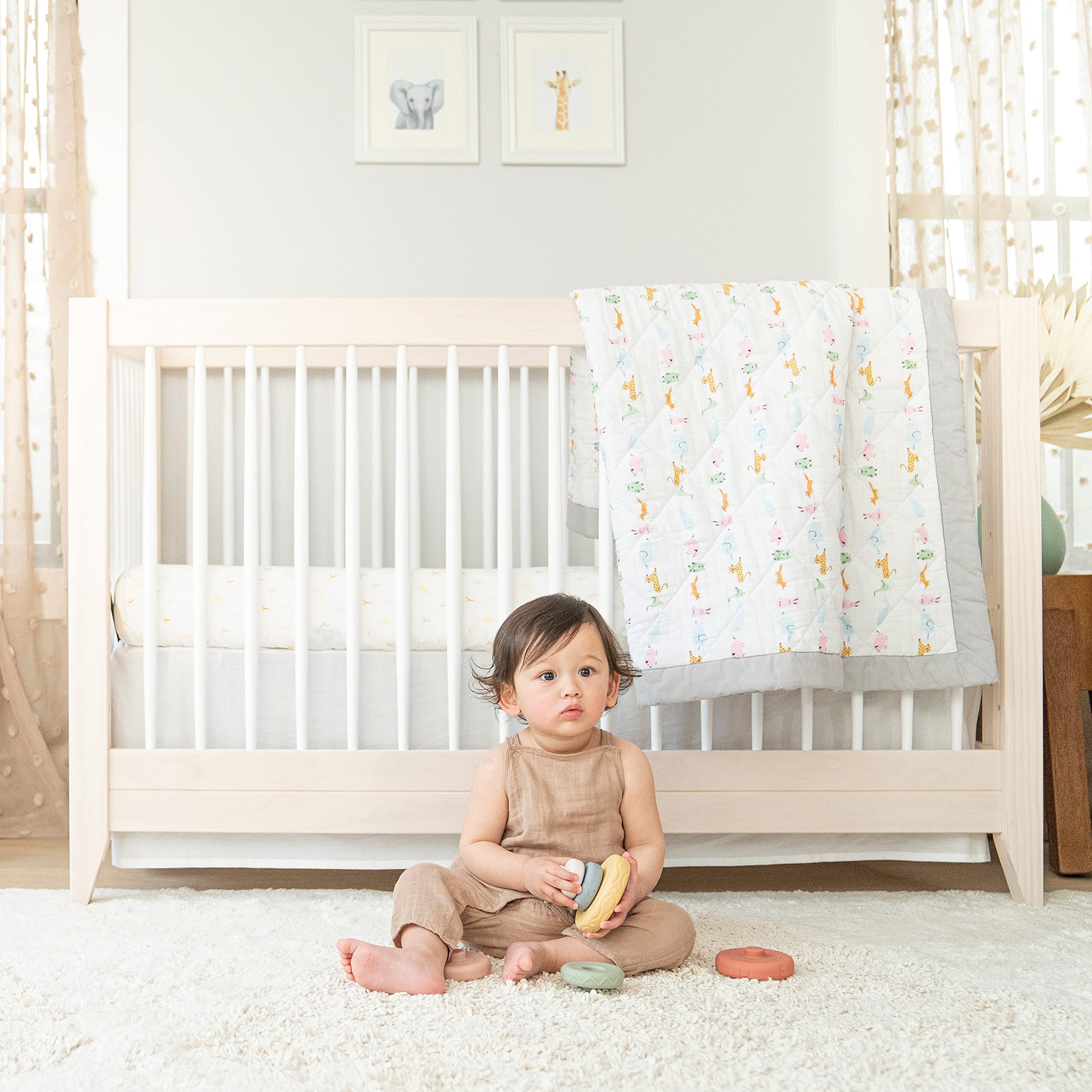 aden and anais Essentials changing pad cover on a standard pad promotes easy cleaning.