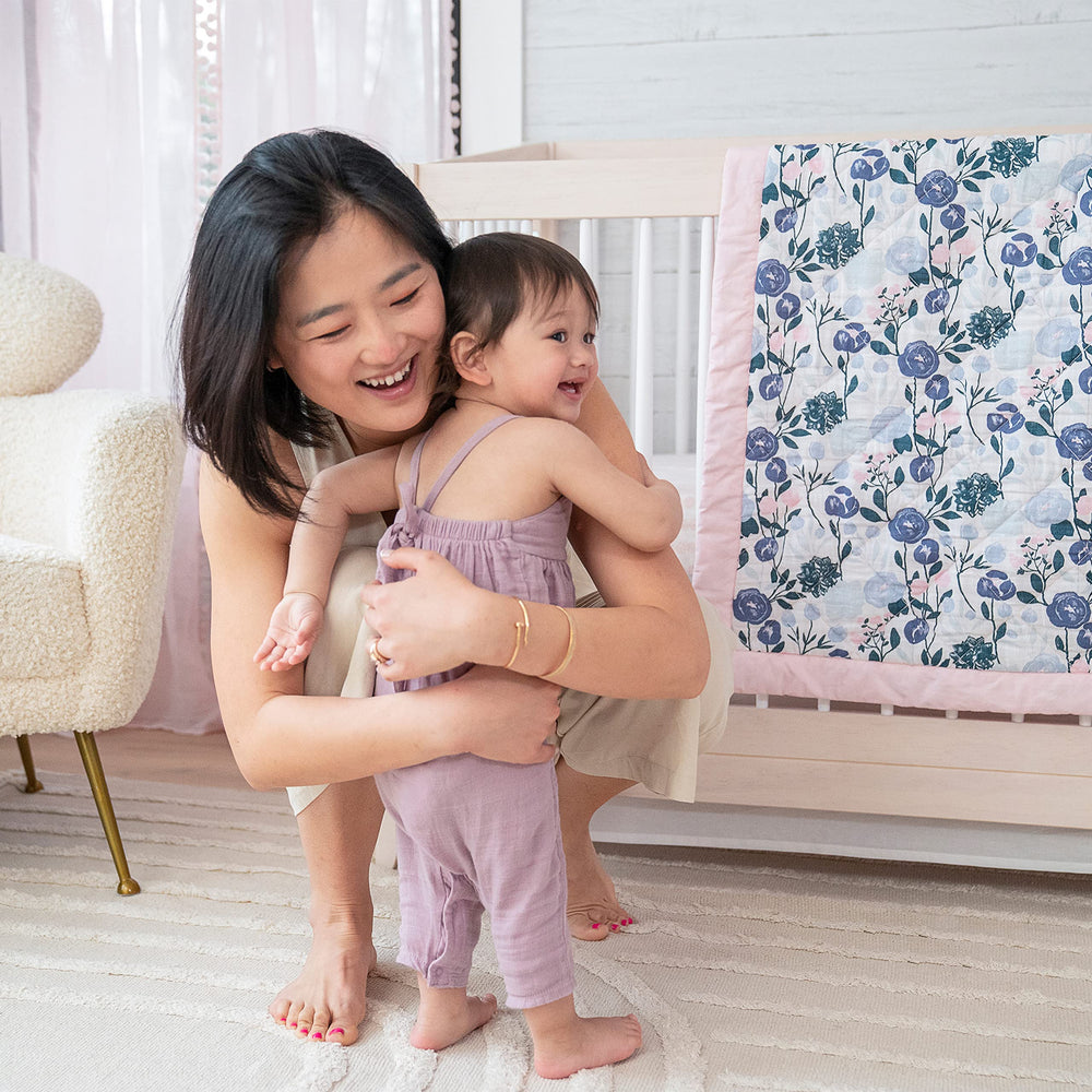 aden + anais Coordinated nursery look with matching sheets and pad cover