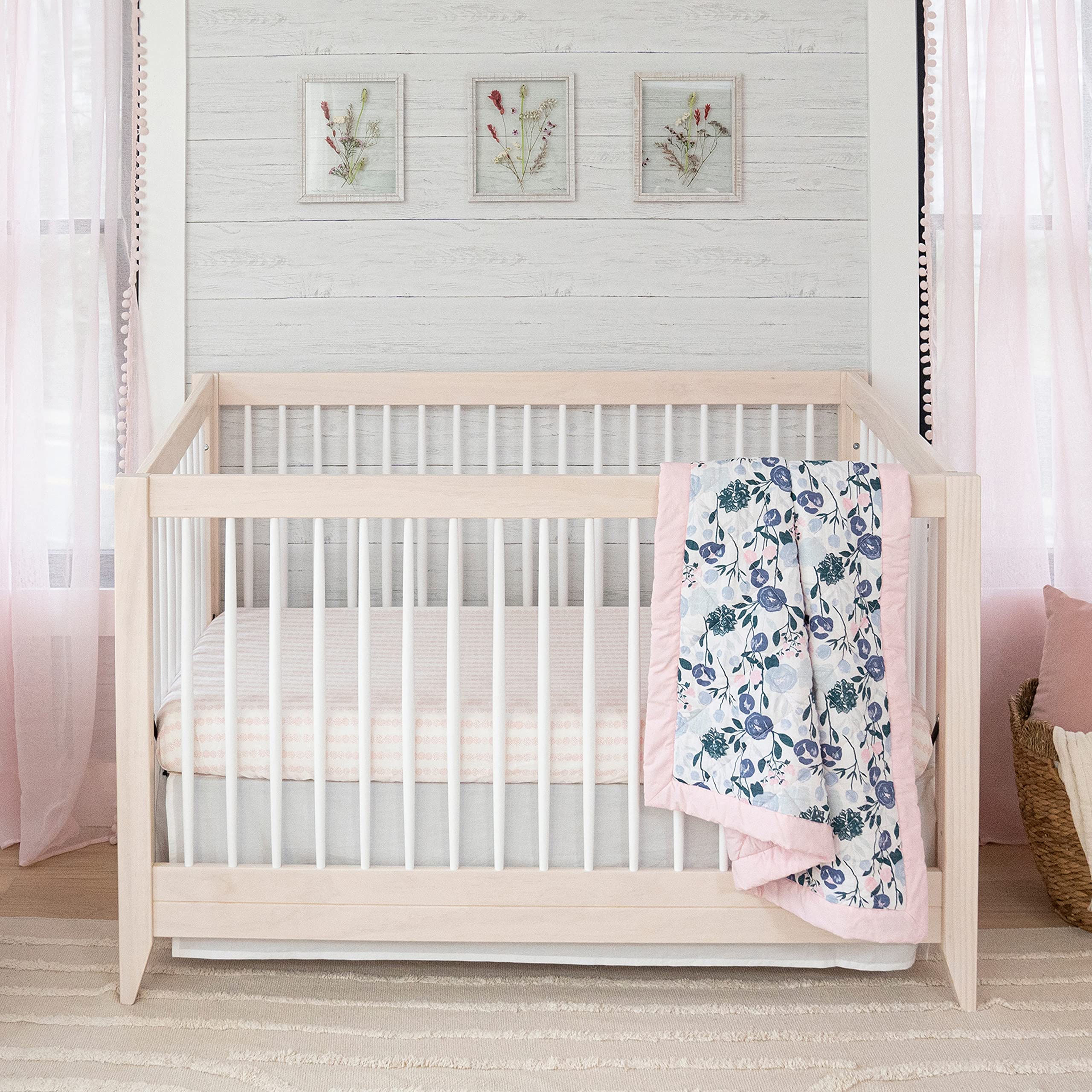 aden + anais Essentials crib skirt coordinates with nursery decor for a polished look