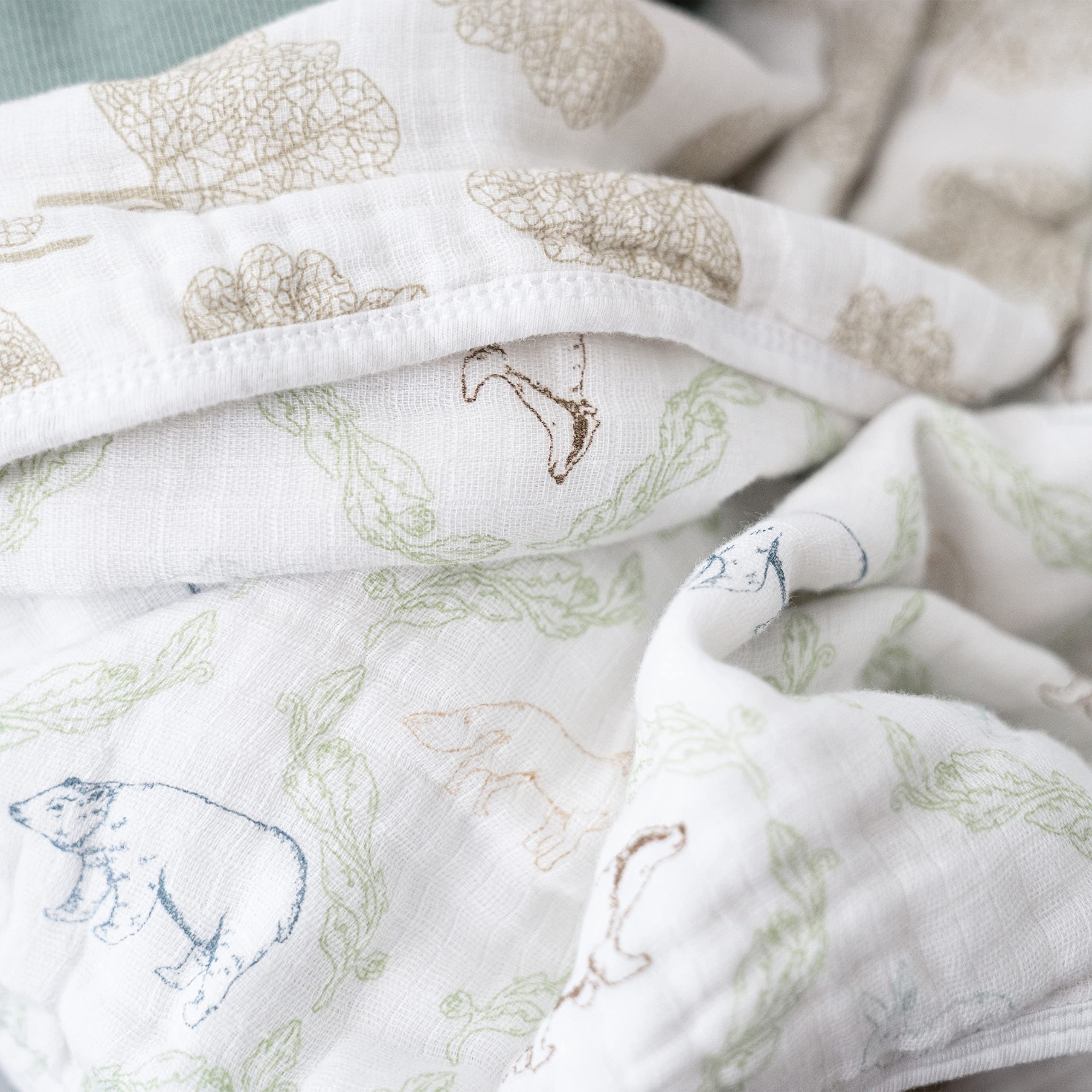 Close-up of aden + anais Dream Blanket showing soft cotton muslin and durable weave.