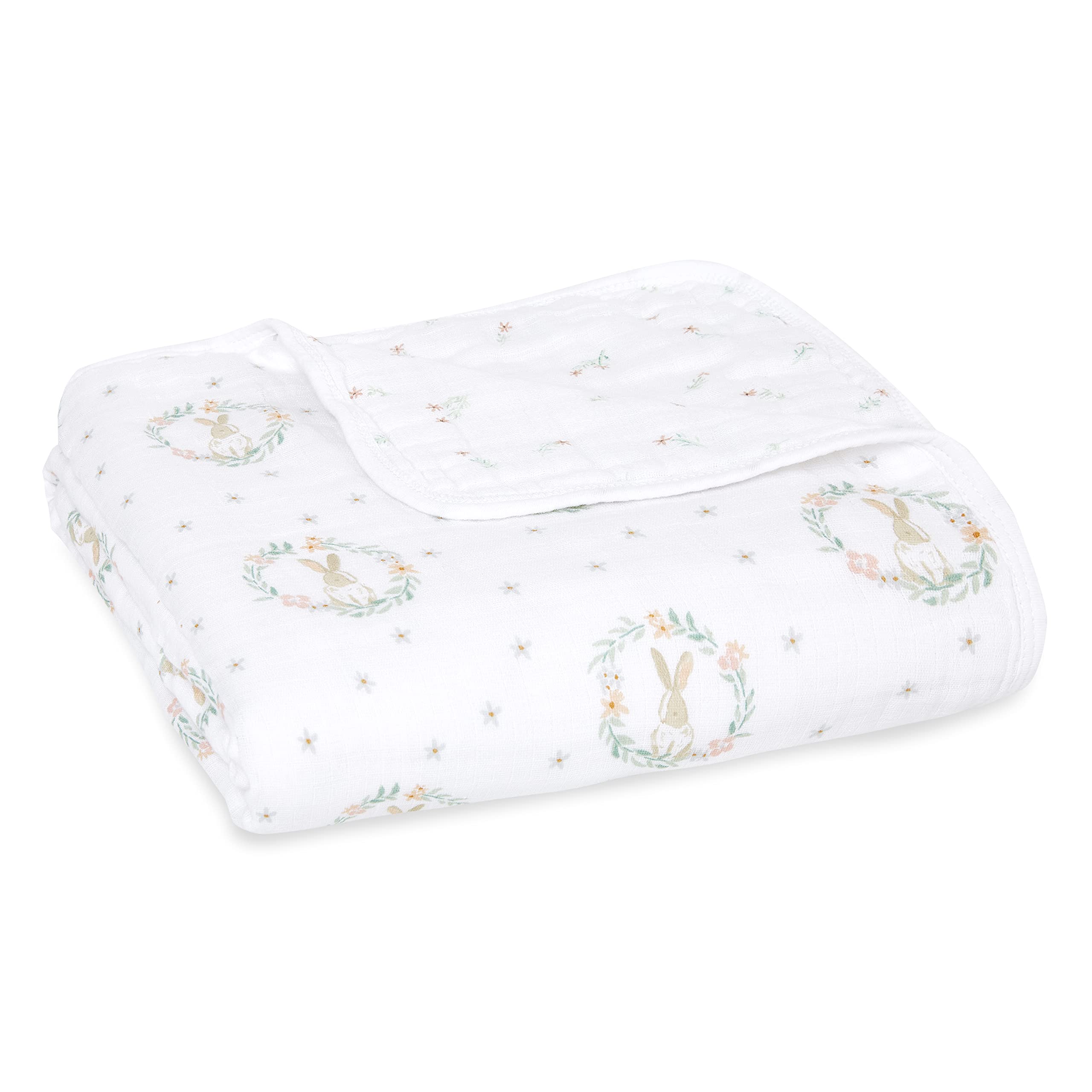 aden + anaïs Essentials Dream Blanket laid flat, breathable four-layer muslin for newborn comfort.