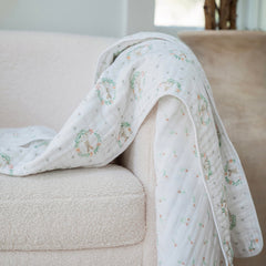 aden + anaïs Essentials Dream Blanket in use during tummy time provides a cozy, breathable play surface.