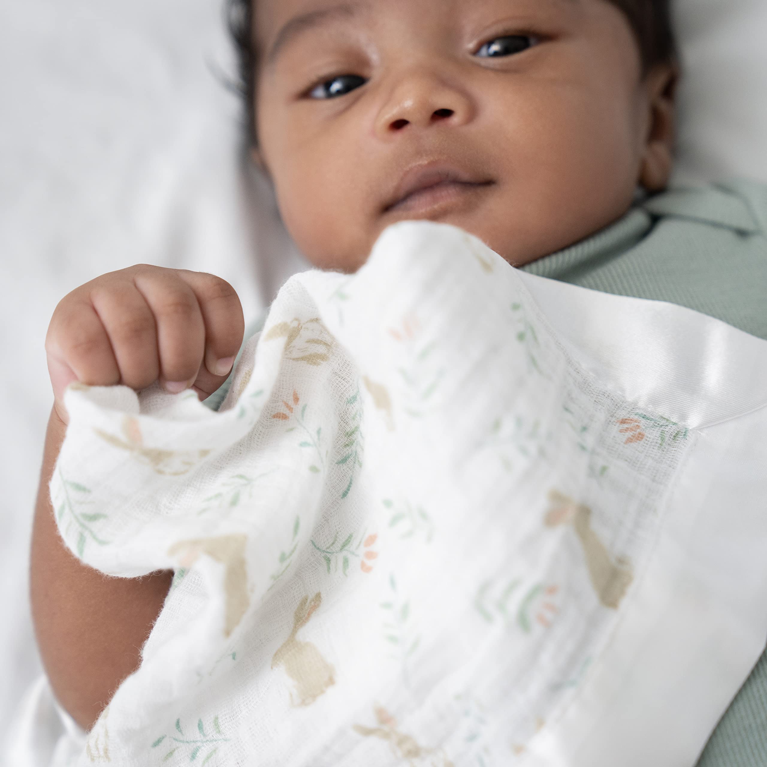 Issie security blanket by aden andanais shows open weave for breathable comfort on the go.