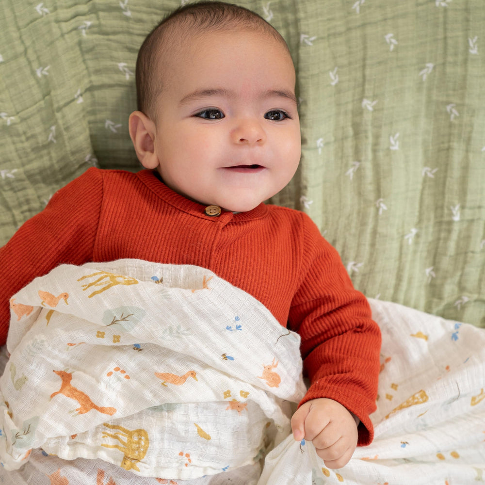 aden + anais Essentials 4-pack Sage Woodland swaddles, oversized 44x44 inches for versatile wrapping.