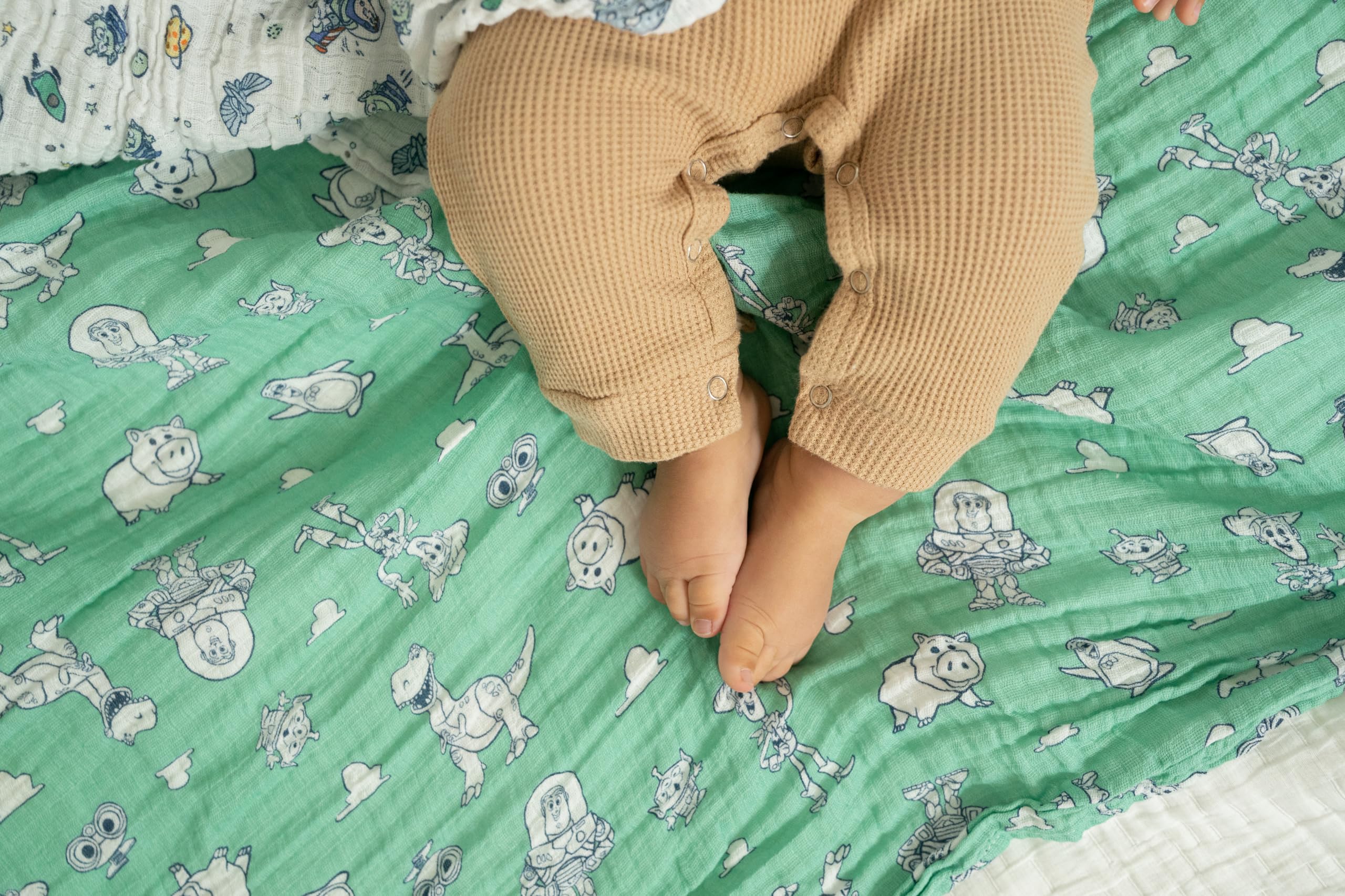 aden + anais Essentials Muslin Swaddle baby playtime spot, tummy time comfort.