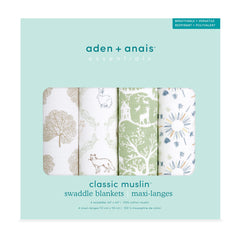 aden and anais Essentials muslin swaddle wrapped around baby for secure comfort.
