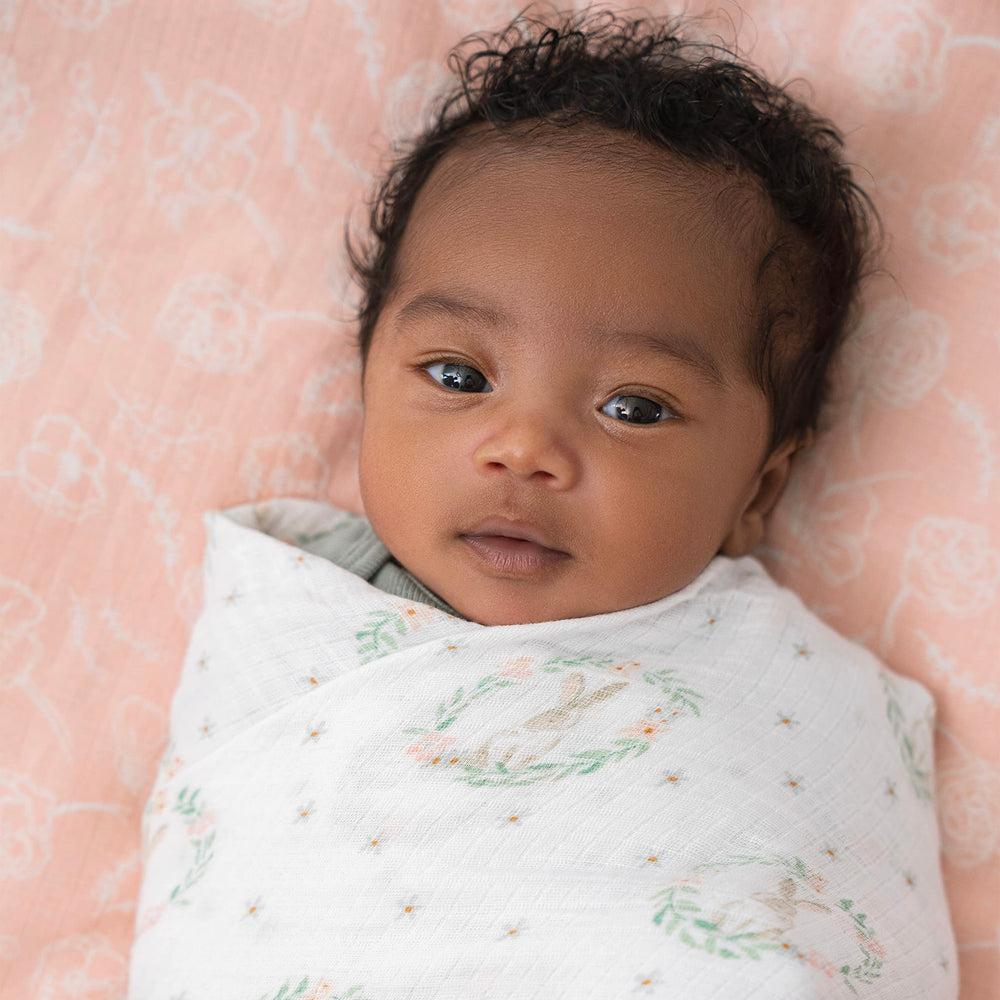 aden +anais muslin swaddle as a tummy time mat for playtime