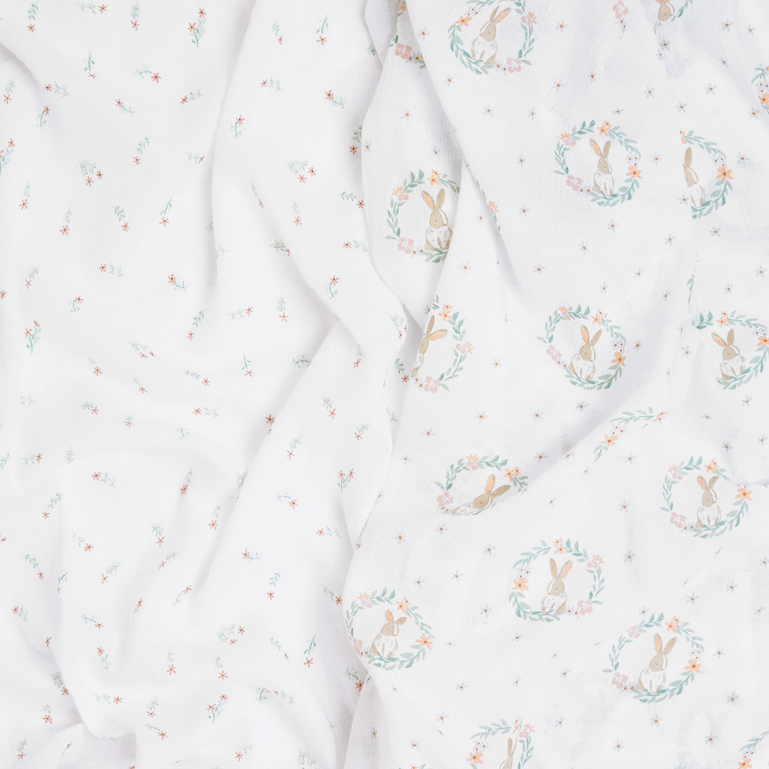 aden-anais Essentials Swaddle Blanket Blushing Bunnies used as stroller cover on outings.