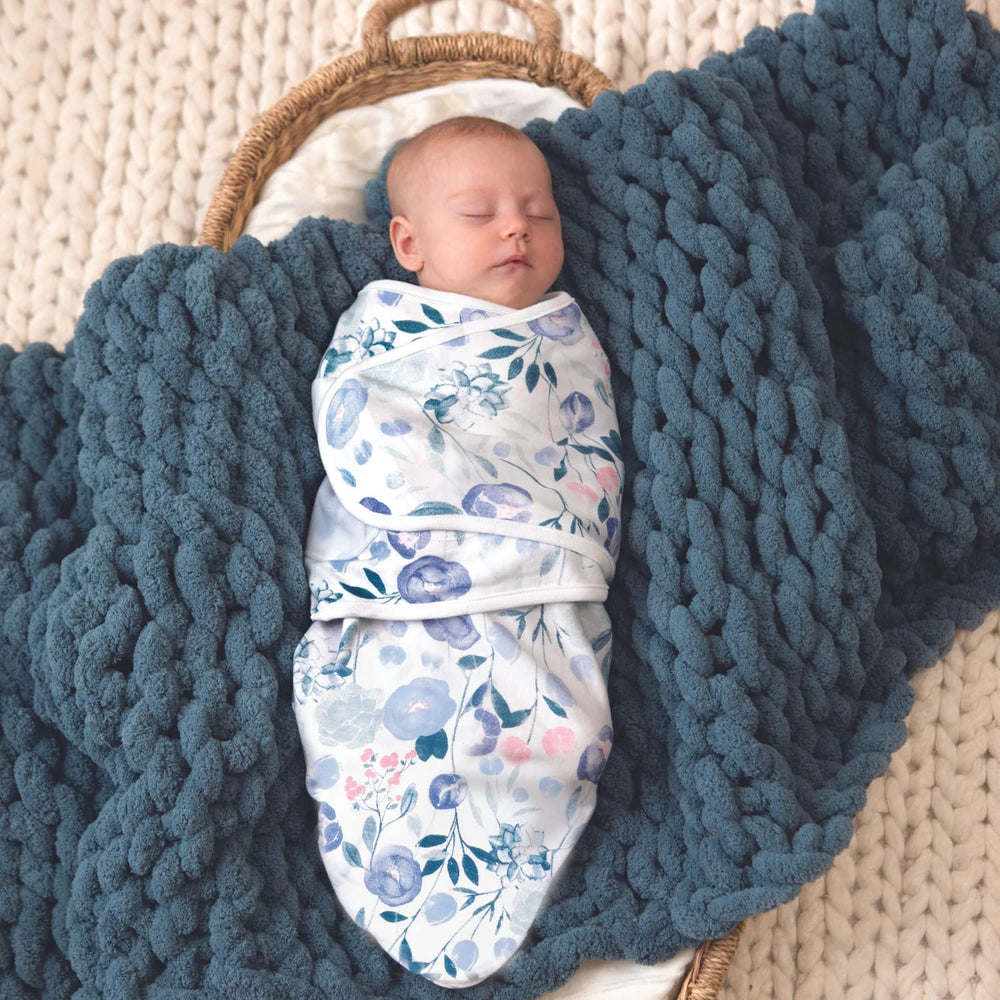 aden + anais Essentials small/medium swaddle fits 7-14 lbs for newborn comfort.