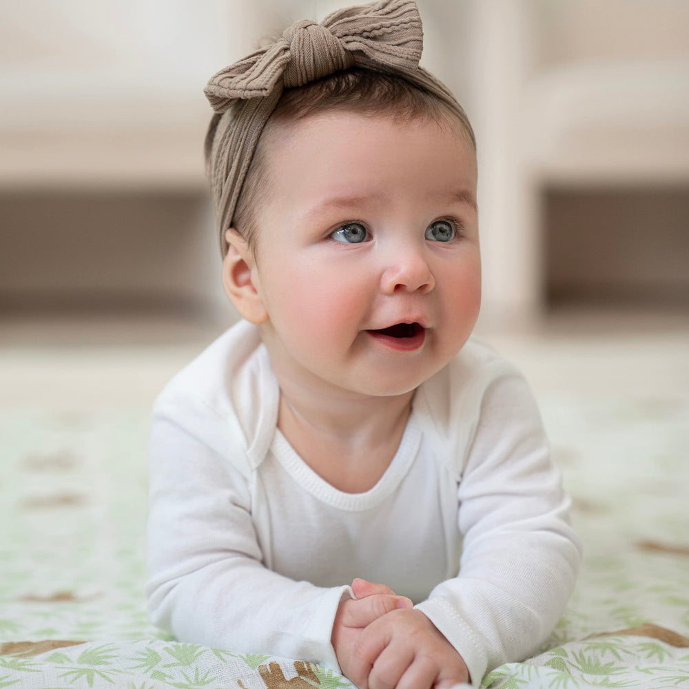 aden + anais Essentials swaddle tummy time mat for soft play surface