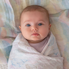 aden + anais muslin swaddle as stroller cover offering lightweight shielding and airflow