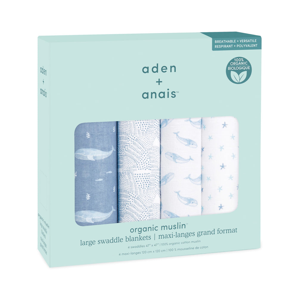 aden + anais Oceanic swaddle blanket: baby swaddled for calm sleep.