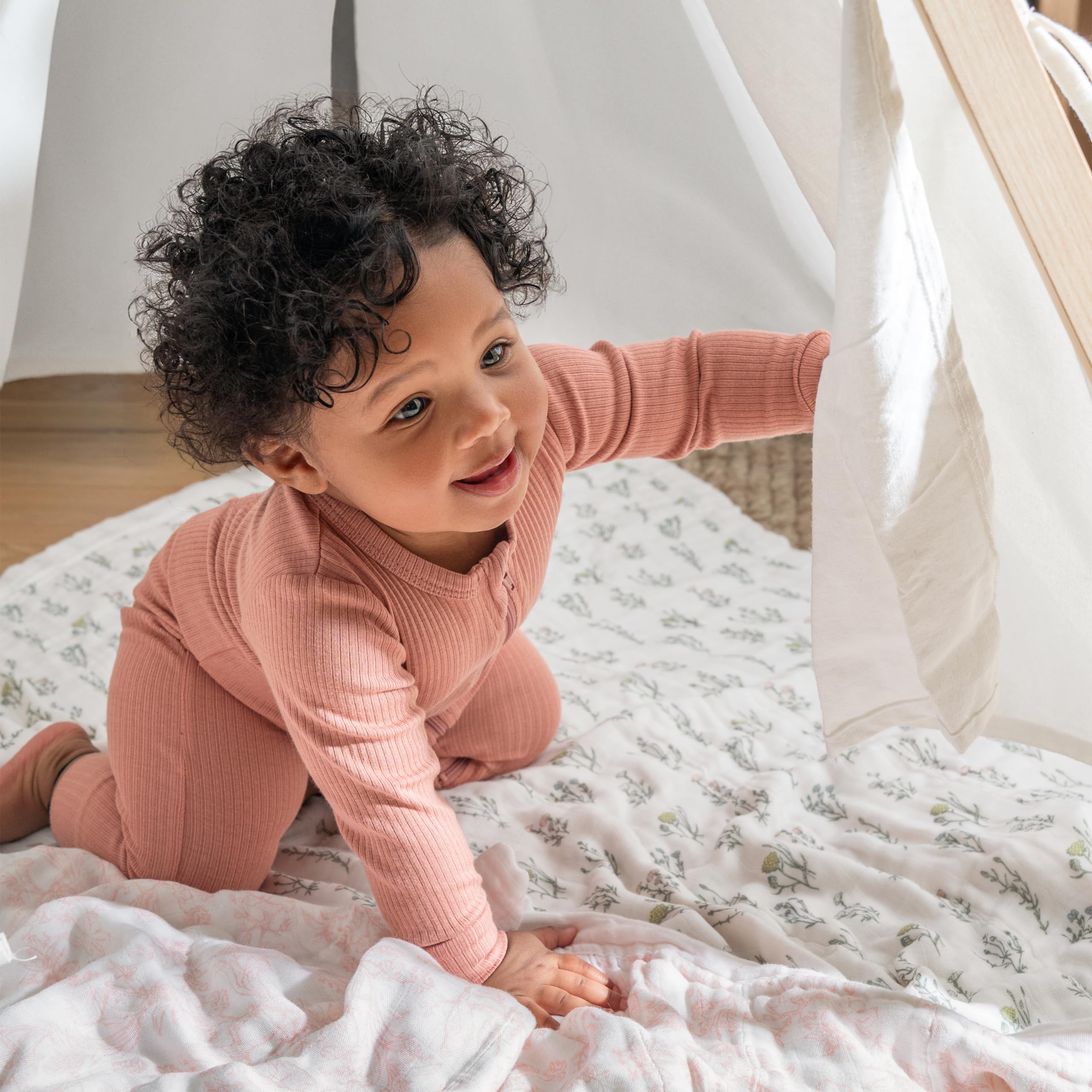 aden + anais bamboo viscose blanket in nursery, versatile stroller blanket